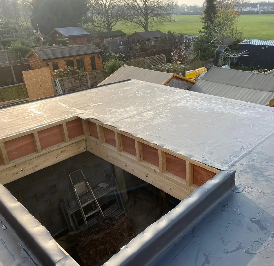 Flat roof extension in progress with rooflight opening